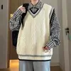 Chaleco suéter de punto trenzado con cuello en V estilo universitario para hombre, de otoño e invierno, moderno, retro, corte holgado, tejido en capas, en negro