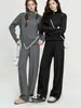 Conjunto casual de punto de color liso para mujer, nueva colección otoño/invierno 2026, con un suéter de media cremallera y pantalones de pierna ancha de cintura alta, un conjunto de dos piezas