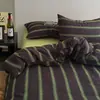 Juego de ropa de cama de cuatro piezas de algodón puro estilo Muji sábana de algodón funda de edredón rayas blancas y negras sensación de lujo ligero alta gama ropa de cama juego de tres piezas para dormitorio