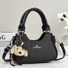 Bolso de mano tipo bolsa de dumplings nuevo y elegante de alta apariencia, bolso de hombro o axila versión coreana, bolso cruzado para mujer, bolso para mujer