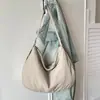 Bolsa de mão da moda e versátil em formato de bolinho para mulheres, nova coleção 2026, bolsa de ombro cruzado, bolsa de axila simples e estilosa, adequada para vendas transfronteiriças