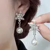 Pendientes de Clip Elegantes de Lujo Ligero con Borla Larga Sin Perforación Ojo de Gato Estrella Diamante Brillante Pendientes Elegantes de Estilo Frío Nicho