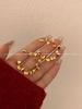 Pendientes de círculo irregular con ondas de diseño de nicho europeo y americano, pendientes de botón de temperamento versátiles retro de alta calidad para mujeres