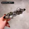 Pinzas para el cabello de pico de pato de alta gama estilo coreano con incrustaciones de perlas y diamantes para mujer, con un diseño lujoso para flequillos laterales y peinados en la parte posterior de la cabeza, un nuevo accesorio para el cabello para mujer