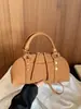 Bolso de mano, bolso tote pequeño, sensación de alta gama, versátil para ir al trabajo, bolso de hombro cruzado, nuevo bolso vintage para mujer Otoño e Invierno 2026, transfronterizo