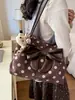 Bolso tote de ante con lunares y lazo de estilo coreano de moda para mujer, nuevo y moderno 2026, versátil, de gran capacidad, para llevar bajo el brazo
