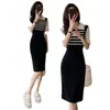 Comercio exterior ropa de mujer toma real vestido de dos piezas falsas a rayas estilo Hepburn para mujer cintura adelgazante verano polo falda larga 20