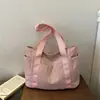 Bolsa feminina transfronteiriça, bolsa tote de cor sólida, novo modelo 2026, bolsa de mão casual simples, bolsa de ombro versátil casual prática