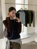 Yuanxi-2026 Otoño estilo minimalista americano raglán color block versátil adelgazante multicolor cuello redondo manga larga camiseta 266443