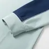 Camiseta de Manga Larga para Hombre Primavera, Otoño e Invierno Nueva Camisa de Capa Interior de Color Contrastante Marca de Moda Top Holgado de Cuello Redondo
