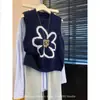 Elegante colete de tricô em camadas florais tridimensionais para mulheres, estilo coreano de outono, suéter macio e delicado, top sem mangas