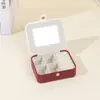 Exquisita caja de joyería de gamuza de moda, caja de almacenamiento de joyería portátil, caja multifuncional para pendientes, caja para anillos, fabricantes al por mayor