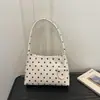 Bolsa de ombro elegante e versátil com poá texturizado estilo coreano 2026 nova moda de nicho com alto acabamento simples