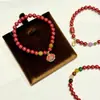 Pulseira de Cristal de Nuvem Auspiciosa com Cinnabar Natural Emendado Multi-Tesouro para Mulheres, Novo Estilo Chinês Luxo Leve Alta Qualidade Pulseira com Caractere da Fortuna de Areia Dourada Roxa