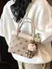 Bolso tipo cubo casual estilo coreano, nuevo bolso de mano otoño e invierno 2026, bolso de hombro y cruzado de moda con lunares único
