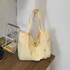 Bolso grande de gran capacidad y ligero para mujer, nuevo modelo de verano 2026, bolso de mano casual de moda para la escuela y el trabajo, bolso de hombro grande