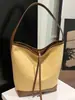 Bolso tipo cubo de estilo casual perezoso de alto valor 2026 Otoño Nuevo Elegante Sensación Relajada Color Sólido Gran Capacidad Bolso de Hombro