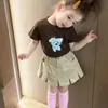 Conjunto para Meninas 2026 Novo Verão Roupas Infantis Casual Camiseta de Manga Curta com Estampa de Cachorro e Conjunto de Duas Peças com Saia