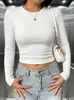 Camiseta de tricô branca slim fit de manga comprida para mulheres, justa, modeladora, top base versátil, estilo garota ousada, gola redonda, top curto