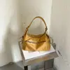 Bolso de axila de diseño de nicho para mujer transfronterizo, bolso tipo empanada multi-bolsillo para el día a día, bolso versátil y de moda para hombro y crossbody