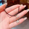 Cadena Corta para Clavícula de Concha de Cristal Negro Hoja de Ginkgo Lujo Accesible Gama Alta Estilo Frío Nicho Collar de Primavera y Verano
