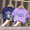 Ropa para niños para niños, camiseta de manga larga de retazos, imitación de dos piezas, camiseta base de algodón puro para niños mayores, nuevo estilo de top para primavera y otoño 2026