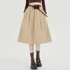 Foto real de saia tulipa simples estilo coreano para mulheres, novo modelo outono e inverno 2026, cintura elástica, versátil, saia evasê que valoriza a silhueta 18427