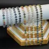 Pulseira Colorida de Pedra Preciosa Flor de Trevo de Quatro Folhas Transfronteiriça Europeia e Americana, Fashionável e Versátil, Luxo Leve com um Toque de Alto Padrão, Pulseira de Cobre Cravejada com Zircônia de Diamante Completo