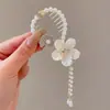 Clip de coleta de aleación con borla de lirio del valle, nuevo para la primavera de 2025, accesorio para el cabello estilo Mori para mujer, pasador para moño dulce
