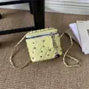 Bolso pequeño de cadena de rombos para mujer 2026 otoño nuevo estilo individual elegante temperamento ins moderno de un solo hombro bandolera bolso cuadrado pequeño