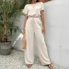 Conjunto de duas peças da moda e elegante para mulheres, com camiseta lisa de gola redonda e calça reta acinturada, novo estilo para o comércio exterior transfronteiriço europeu e americano de 2026