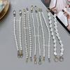 Nueva funda para teléfono móvil DIY, joyería con perlas, cadena de mano con perlas, cadena para bolso, moderna funda para teléfono móvil para mujer, cadena colgante de cristal resistente a caídas