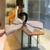 Novo grampo de cabelo com laço tridimensional de bolinhas para mulheres, moderno e versátil, adequado para penteados presos na nuca, acessório de cabelo tipo pinça de tubarão