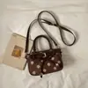 Bolsa retrô fashion de bolinhas de nicho 2026 nova bolsa transversal casual feminina bolsa de mão estilosa, requintada e única