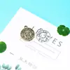 Accesorios para joyería DIY 18mm aleación doce constelaciones tarjeta redonda - Géminis