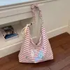 Bolsa de mano rayada transfronteriza para mujer, gran capacidad, nuevo modelo de verano 2026, mochila escolar para estudiante, bolso bandolera de hombro con dibujos animados