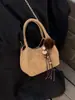 Bolsa de Mão Estilo Balde Nova Tendência Inverno 2026 Feminina Bolsa de Ombro de Nicho Bolsa Transversal Versátil e Fashion