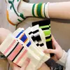 Calcetines Zhuji, calcetines de otoño e invierno de media pantorrilla para mujer, estilo japonés, calcetines altos a rayas recomendados, calcetines largos transpirables y absorbentes de sudor, venta al por mayor
