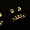 O Conjunto de Hip-Hop Mais Vendido da Amazon Europeu e Americano Dente de Ouro Único Cobre Cor 18K Presas Halloween Hip-Hop Dentes Peculiares