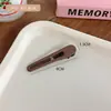 Pinza para el pelo de cachorro con forma de hueso, estilo lindo y femenino, pasador versátil y elegante, pinza de pico de pato decorativa, dulce accesorio para el pelo