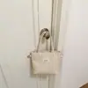 Nova Bolsa de Palha Tecida Simples para Mulheres Verão 2026, Bolsa de Mão Estilosa e da Moda, Bolsa Transversal Versátil para o Dia a Dia
