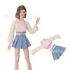 30cm11 pulgadas cambiar juguetes nuevo comercio exterior transfronterizo moda europea y americana traje de falda pantalones ropa de muñeca Bobby