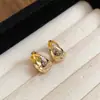 Remate de Bajo Precio~Aretes Flor de Aguja Plateada Ovalados, Estilo Europeo y Americano, Diseño Minimalista, Aretes de Nicho