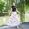 26 Nova Saia Estampada Estilo Boho Resort Europeu e Americano Primavera/Verão com Barra Larga para Mulheres