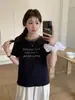 2026 Verão Novo Feminino Casual Bloco de Cores Gola Redonda Flocagem Carta Manga Curta Camiseta Versátil Fina Top Estudante Tendência
