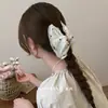 Presilha de cabelo listrada suave estilo coreano para mulheres, acabamento elegante em renda, adequada para prender o cabelo na parte de trás da cabeça, presilha tipo tubarão para penteado semi-preso