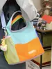 Bolso Tote Cruzado de Hombro Único con Textura de Moda Versátil de Alta Calidad para Mujer, Diseño Minimalista de Nicho Transfronterizo, Nuevo para la Primavera de 2026