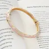 Nuevo brazalete estilo chino de esmalte con goteo de aceite para mujer, pulsera versátil pintada artísticamente vintage, superventas transfronterizo, joyería de moda de lujo ligero