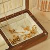 Collar de perlas de alta gama para minorías europeas y americanas, aretes de botón con lazo chapados en oro de 18k que no se desvanecen, joyería transfronteriza