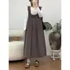 Nuevo vestido de tirantes simple de otoño estilo japonés sin mangas, retazos, dobladillo con volantes, suelto, versátil, juvenil, artístico